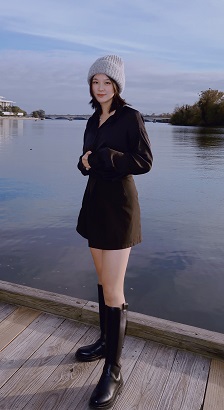 photo of Ava Hu  standing with lake background